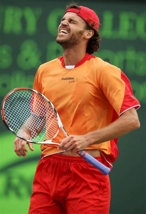 Download Gustavo Kuerten With A Gleeful Smile Wallpaper | Wallpapers.com