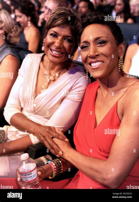 Sally-Ann Roberts, left, and Robin Roberts pose in the audience at the ...