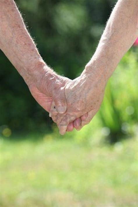 Closeup of elderly couple holding hands | Couple holding hands, Elderly ...