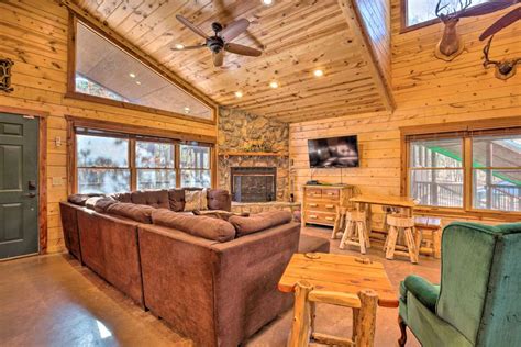 Spacious Broken Bow Cabin w/ Hot Tub & Playground! | Evolve