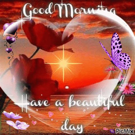 good morning have a beautiful day with flowers and butterflies in the heart shaped glass frame
