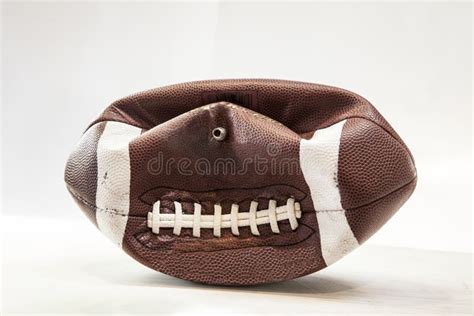 Partially Delfated Football Stock Image - Image of deflategate, scandal: 50334941