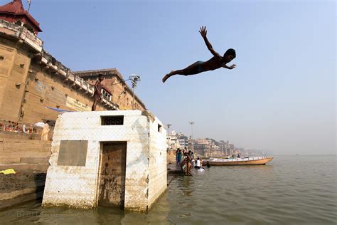 Brett Cole Photography | Boys swim and dive in the Ganges River ...