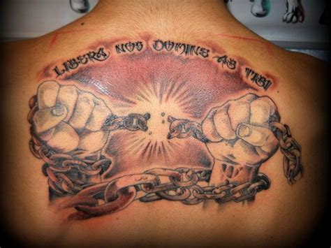 Man Breaking Chains Tattoo