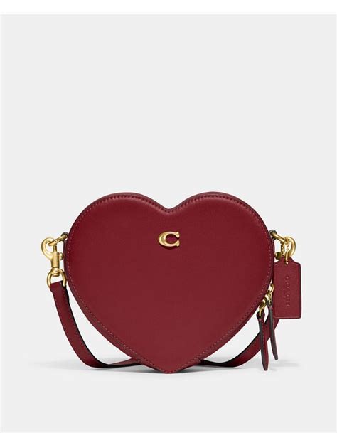 Actualizar 91+ imagen pink heart shaped prada bag - Abzlocal.mx