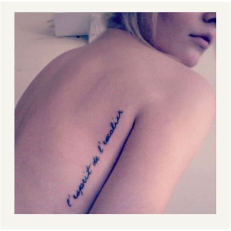 Side back tatoo | French tattoo, Small tattoo placement, Tattoos