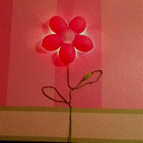 IKEA wall flower light. Super cute!:)