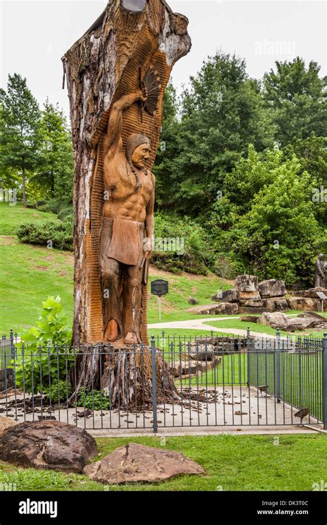 Statue of Chief Tuscumbia carved into tree at Spring Park in Stock ...