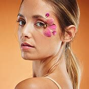 Model, eye and flower for makeup at studio for portrait, art and ...