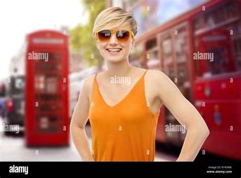 happy teenage girl over london city street Stock Photo - Alamy