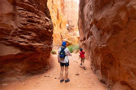 Tourists in Fiery Furnace Hiking Trail in Utah Stock Photo - Image of ...