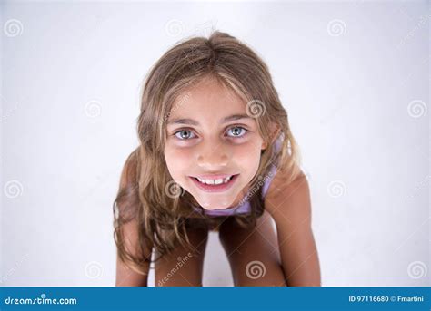 Happy Blond Girl Looking at the Camera from Front Stock Photo - Image ...