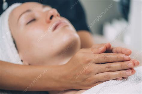 Face lifting massage - Stock Image - F031/0651 - Science Photo Library