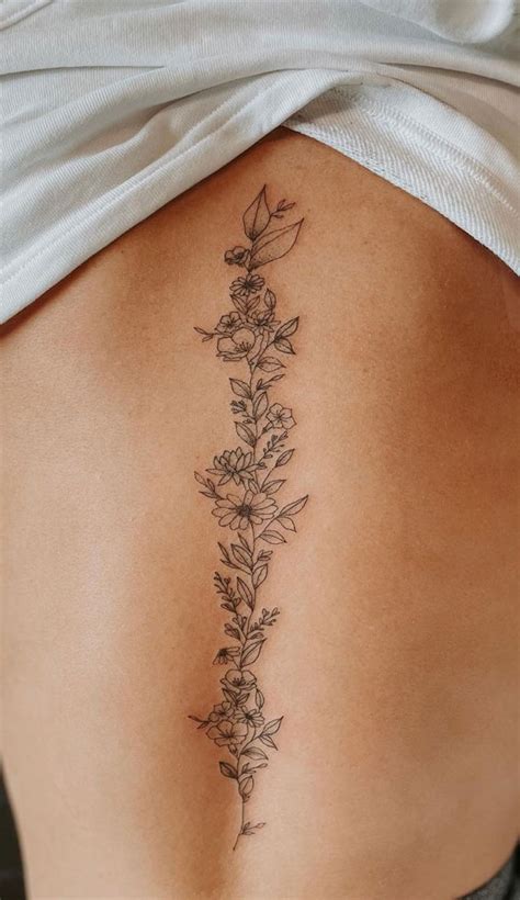 70+ Beautiful Tattoo Designs For Women : Birth Flower Spine Piece I Take You | Wedding Readings ...