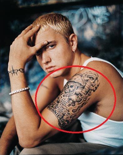 Eminem's 9 Tattoos & Their Meanings - Body Art Guru