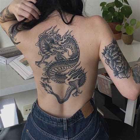 Dragon back tattoos in 15 images for men and women