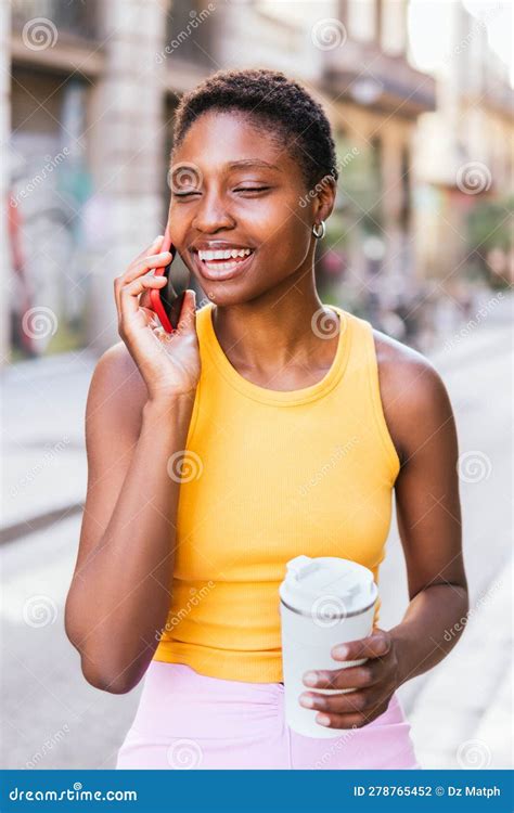 Positive African American Female Beauty Having a Telephone Call in the Street Stock Photo ...