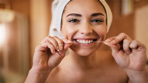 THE IMPORTANCE OF BRUSHING AND FLOSSING: TECHNIQUES AND RECOMMENDATIONS