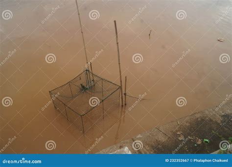 Fish trap in the river stock image. Image of city, cage - 232352667