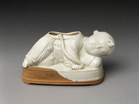 Base of a pillow in the form of a boy | China | Northern Song dynasty ...