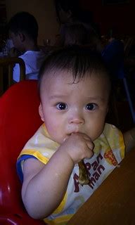Isaac eating ayam bakar at Garamerica | Isaac eating chicken… | Flickr