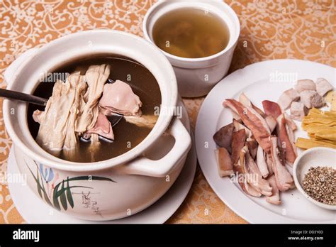 delicious pork intestine soup in white casserole Stock Photo - Alamy