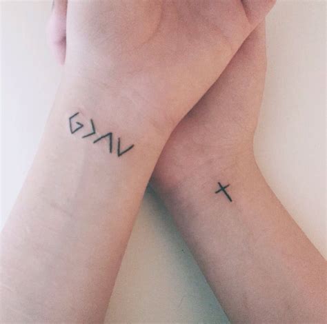 "God is greater than the highs and lows." Nadia Thomas' tattoo | Wrist tattoos for guys, Cool ...