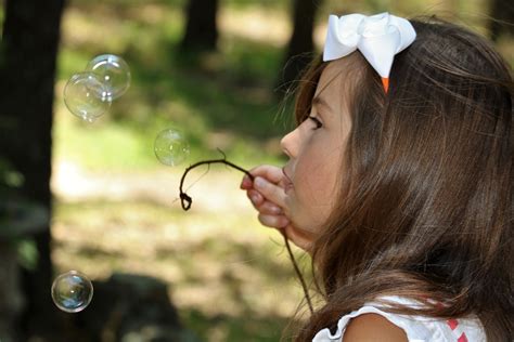 Little Girl Playing With Bubbles 2 Free Stock Photo - Public Domain ...