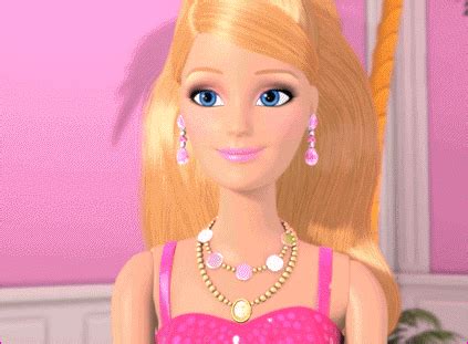 the barbie doll is wearing a pink dress