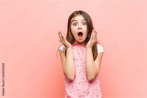 Cute little girl surprised and shocked. Stock Photo | Adobe Stock