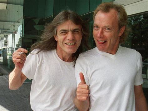 Malcolm Young (left) and Angus Young, two members of AC/DC when they arrived in Perth for a ...