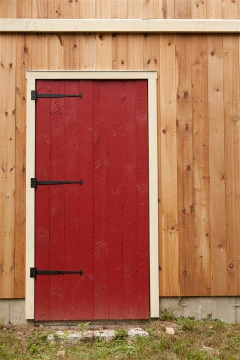 Red barn door entrance of Yankee Barn Home barn | Red barn door, Yankee ...