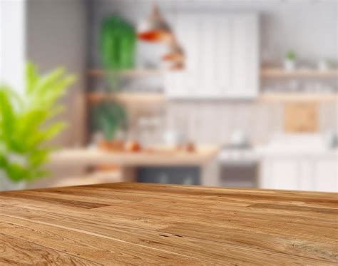 Wood table top on blurred kitchen background 19878087 Stock Photo at Vecteezy