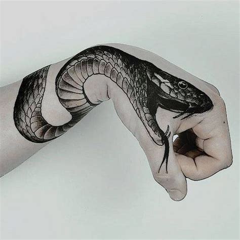 Photo | Snake tattoo design, Snake tattoo, Cobra tattoo