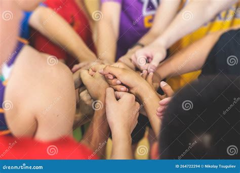 Team of Kids Children Basketball Players Stacking Hands in the Court, Sports Team Together ...