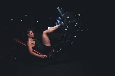 Fit Woman Doing Leg Press Exercise In The Gym - High Quality Free Stock Images