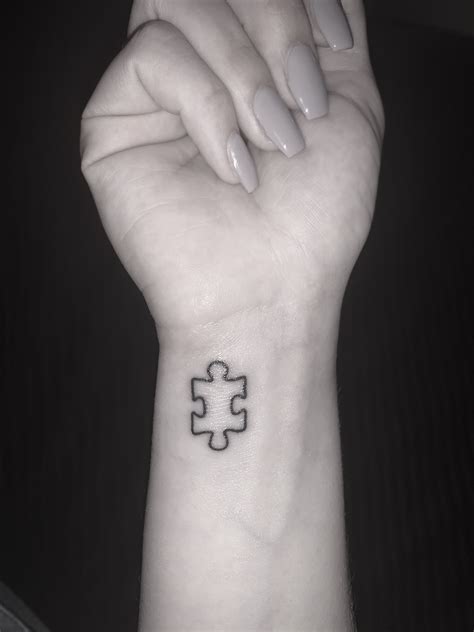 Puzzle piece tattoo | Puzzle piece tattoo, Pieces tattoo, Cute tattoos on wrist