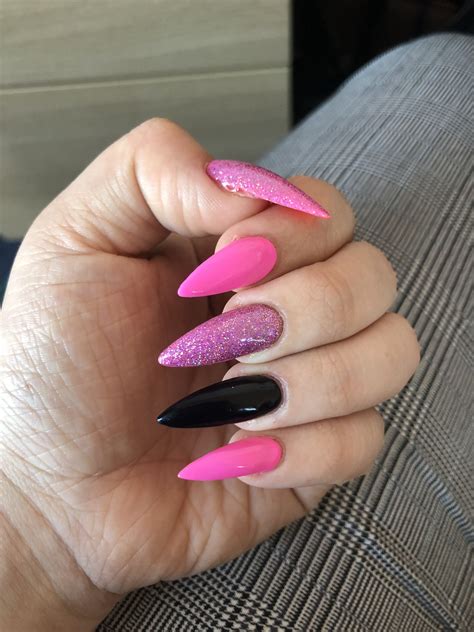 Pink and black acrylic nails. Pink glitter, stiletto, long, acrylic ...