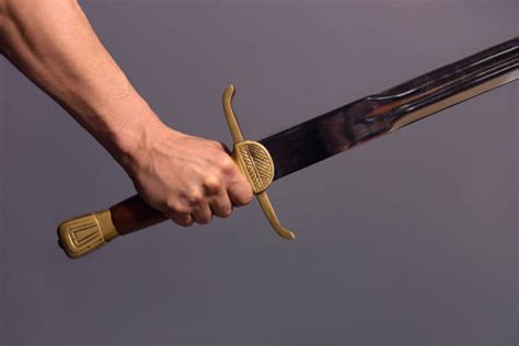 Holding Sword Stock Photos, Pictures & Royalty-Free Images - iStock