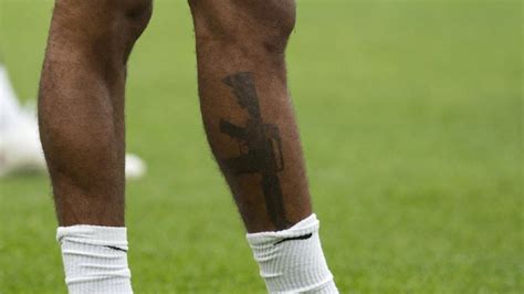 England forward Raheem Sterling defends gun tattoo - BBC News