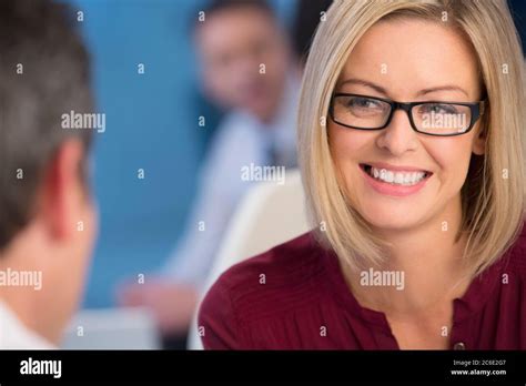 Smiling business people talking Stock Photo - Alamy