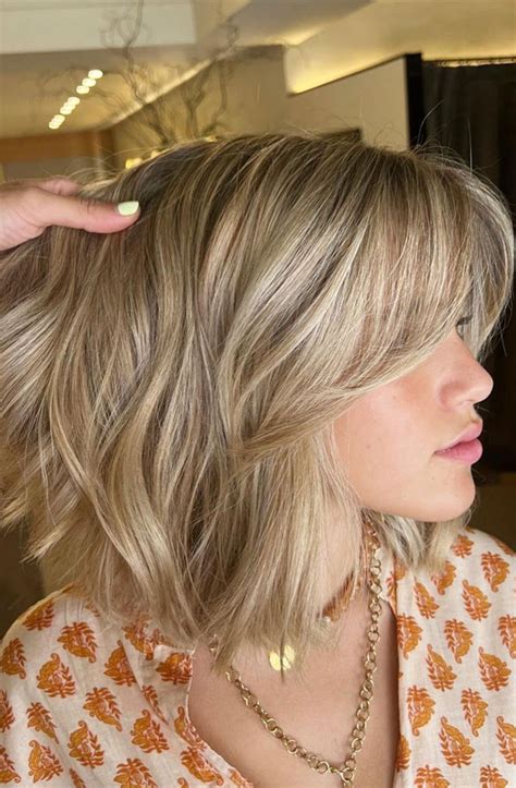 52 Best Bob Haircut Trends To Try in 2023 : Blonde Blunt Bob Haircut