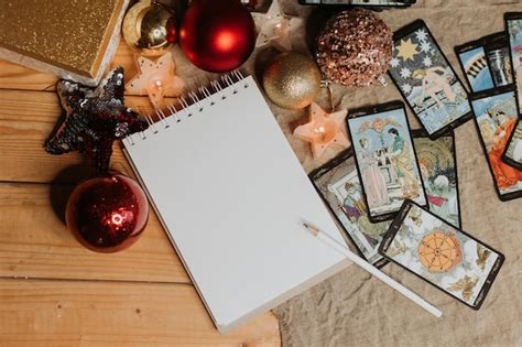 Premium Photo | A table with a book and cards on it