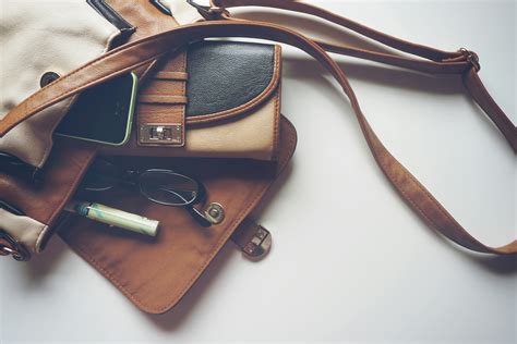 Brown Leather Crossbody Bag With Eyeglasses · Free Stock Photo