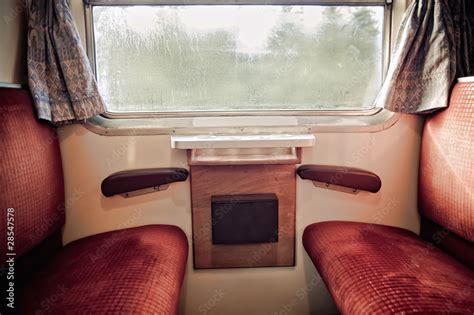 Foto Stock Interior of vintage train carriage | Adobe Stock