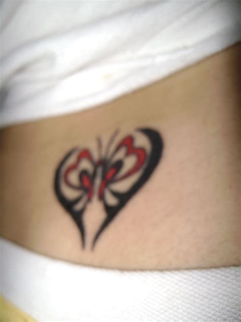 Heart tattoo with tribal design-930 | Tribal heart, Butterfly tattoo, Heart tattoo