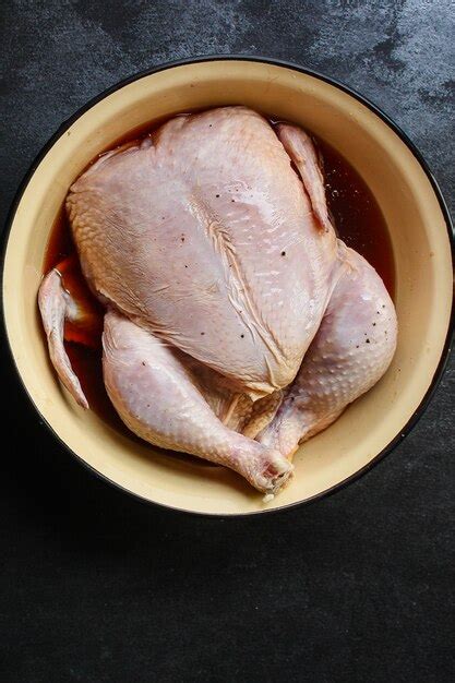 Premium Photo | Raw chicken in marinade for baking or barbecue grill