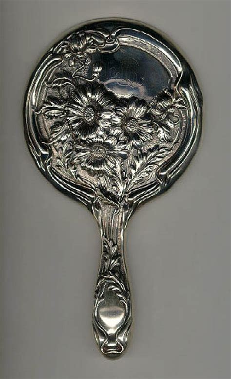 Antique Victorian sterling silver ladies hand mirror