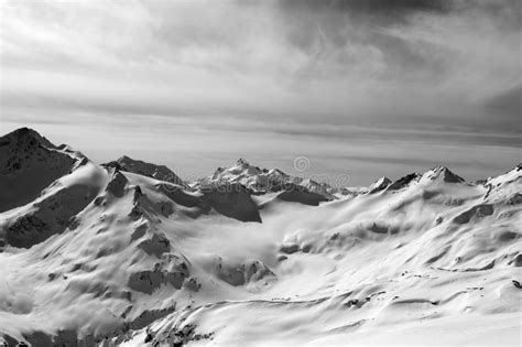 Black and White Snowy Mountains in Evening Stock Photo - Image of rock ...