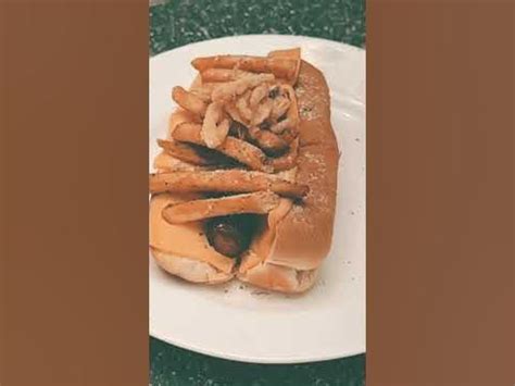 Glizzy Cheese french fry deep fried hotdog with canned fried onions topped with truffle powder 😂 ...